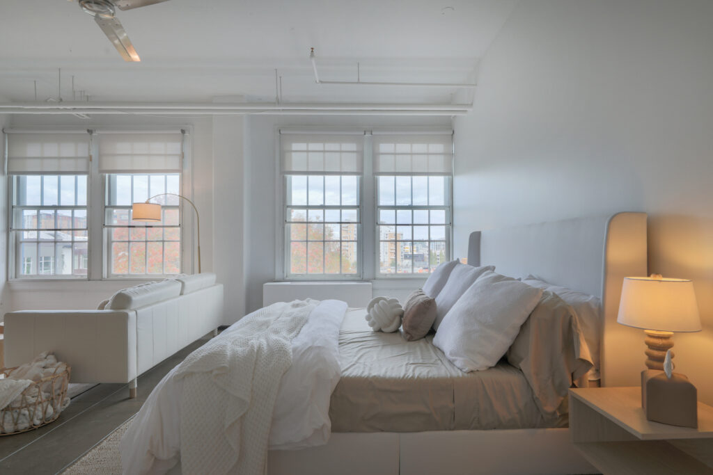 Cozy master bedroom interior photography showing architectural details and soft natural light