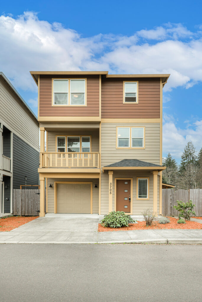 Detailed exterior shot of a modern home entrance with professional lighting and clean composition.