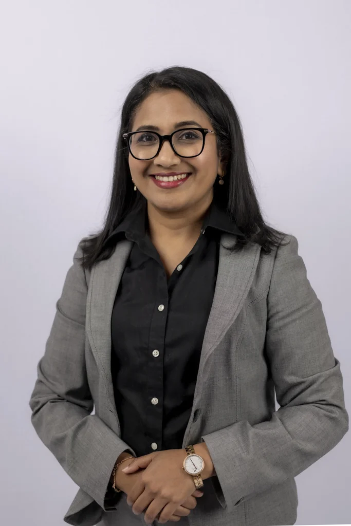 Professional corporate headshot of a woman in Portland by Artem Denisov