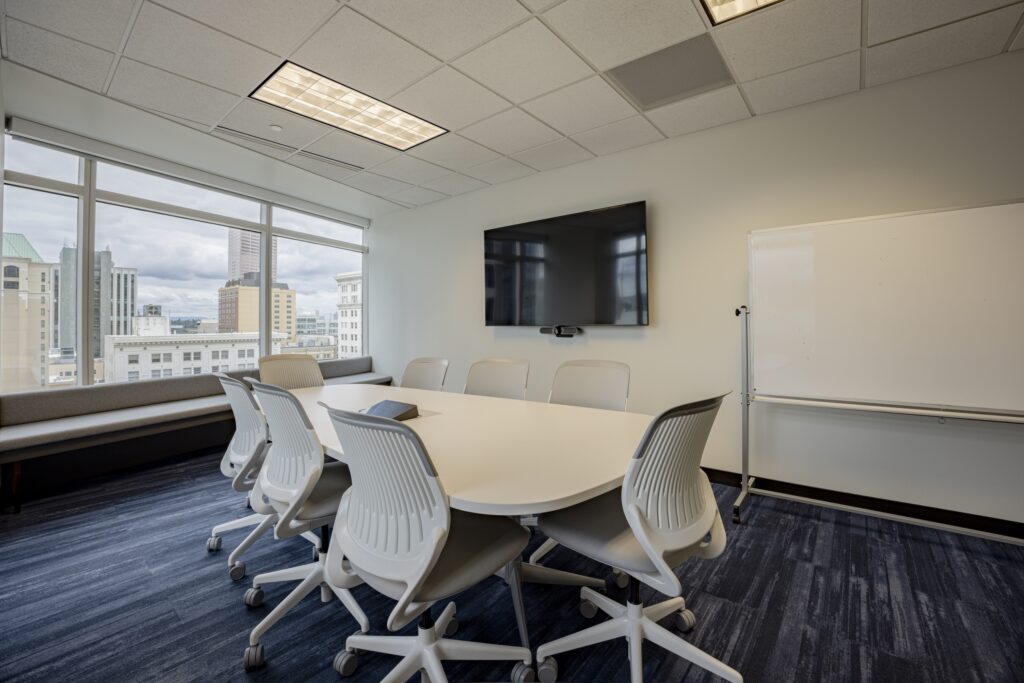 Professional interior architectural imagery of a corporate lobby featuring clean lines and natural lighting.