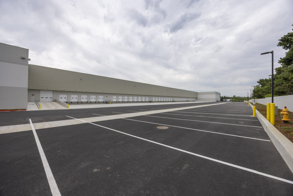 Professional architectural imagery of a logistics distribution center in Portland, Oregon, showcasing functional scale.